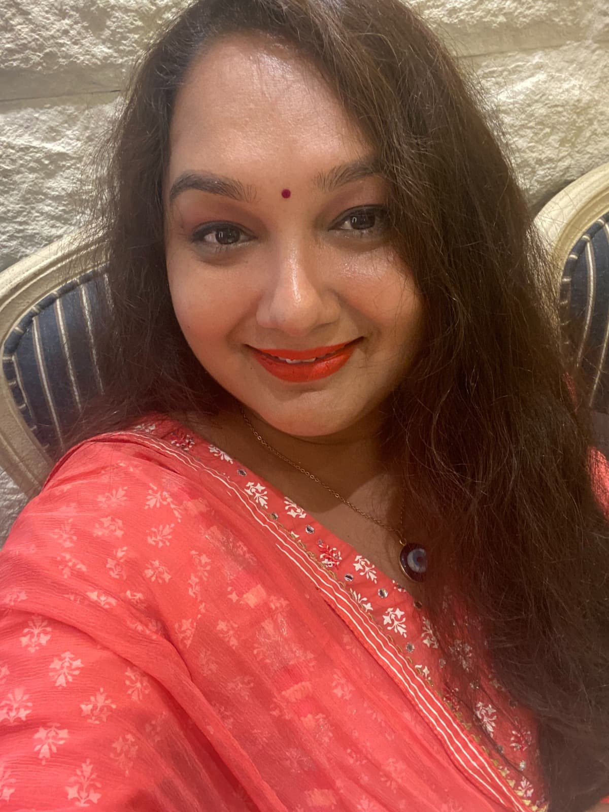 Dr. Devanu in a reflective portrait